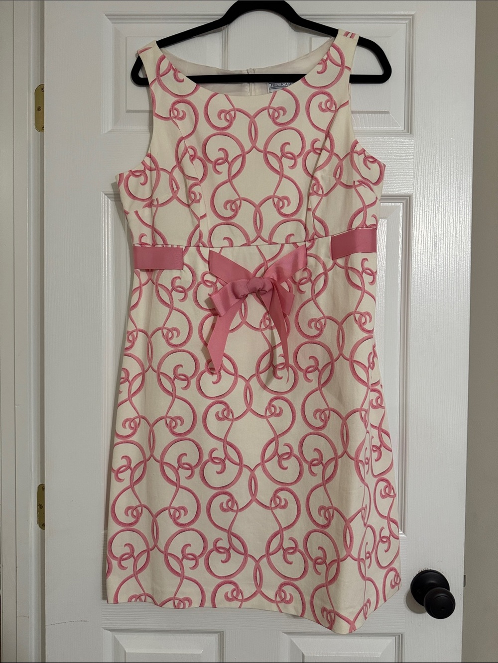 Jessica Howard Cream Dress with Pink Swirl Design and Bow